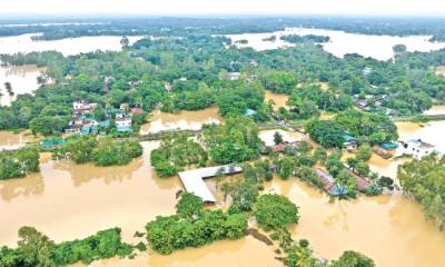 বন্যার ক্ষত, অর্থনীতির চাপ এবং আমাদের দায়িত্ব